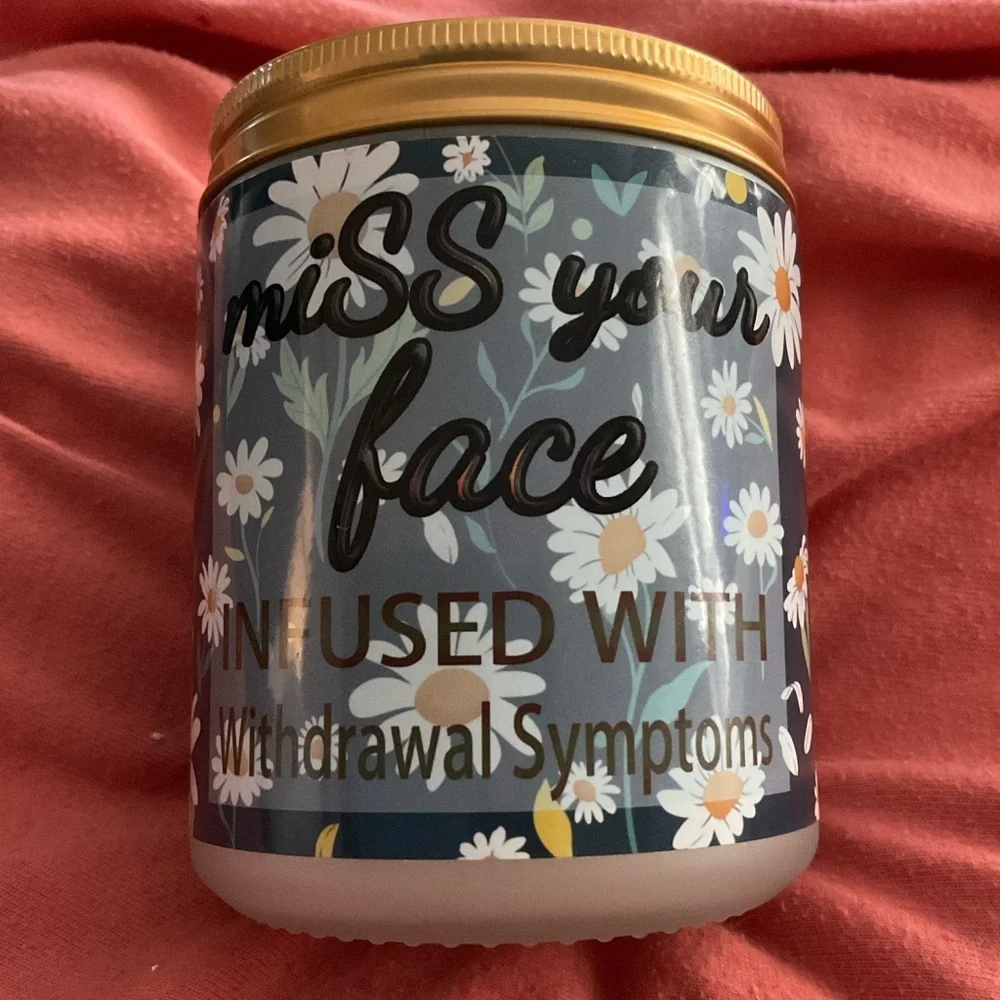 Sea Salt  Scented Candle with Saying on One Side and Loving Couple on the Other.